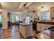 Eat-in kitchen featuring granite countertops, stainless steel appliances, an island, and a breakfast nook at 286 N Greenbriar Dr, Greenwood, IN 46142