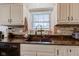 Updated kitchen featuring granite countertops, stainless steel appliances, and ample cabinet space at 286 N Greenbriar Dr, Greenwood, IN 46142