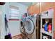 Modern laundry room featuring front load washer and dryer at 286 N Greenbriar Dr, Greenwood, IN 46142