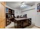 Home office with custom desk, shelving, and natural light at 286 N Greenbriar Dr, Greenwood, IN 46142