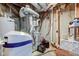 Utility room with water heater, furnace, and storage shelves at 286 N Greenbriar Dr, Greenwood, IN 46142