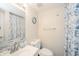 Bright bathroom features a white sink and stylish blue accents at 2900 Helms Rd, Anderson, IN 46016