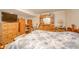 Cozy bedroom featuring wood furniture and a comfortable bed at 2900 Helms Rd, Anderson, IN 46016