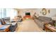 Spacious living room with plush seating, a neutral color palette, and ample natural light at 2900 Helms Rd, Anderson, IN 46016