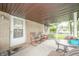 Charming covered porch with seating area and outdoor ambiance at 2900 Helms Rd, Anderson, IN 46016