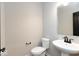 The powder room features a pedestal sink and a sleek black faucet at 331 Oxford Ln, Lebanon, IN 46052