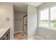 Bathroom featuring a stand-up shower, neutral tile, and view to the outside at 331 Oxford Ln, Lebanon, IN 46052