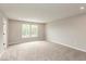 Well-lit bedroom featuring neutral walls and carpet, and abundant natural light at 331 Oxford Ln, Lebanon, IN 46052