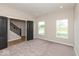 Bedroom with plush carpet, and natural light from two large windows at 331 Oxford Ln, Lebanon, IN 46052