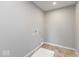 Utility room with neutral colored walls and tile floor and utility connections at 331 Oxford Ln, Lebanon, IN 46052