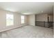 Bright loft space with large windows and a view, complete with neutral carpet at 331 Oxford Ln, Lebanon, IN 46052
