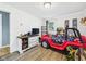 bedroom with a themed car bed, wood-look floors, and a bright atmosphere at 3400 Debra Dr, Anderson, IN 46012