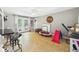 Large living space with access to the back yard and access to other living spaces at 3400 Debra Dr, Anderson, IN 46012