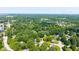 Aerial view of neighborhood in Carmel, Indiana, featuring mature trees and proximity to The Monon Center at 3479 Sugar Loaf Ct, Carmel, IN 46033