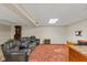 Finished basement boasting comfortable seating, a cozy fireplace, and carpeted flooring for a welcoming atmosphere at 3479 Sugar Loaf Ct, Carmel, IN 46033