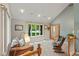 Bright living room featuring a large window, plush carpeting, and comfortable seating with neutral tones at 3479 Sugar Loaf Ct, Carmel, IN 46033