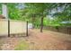 Fenced backyard area offering privacy with some trees for shade at 3898 Chelsea Ter, Greenwood, IN 46143
