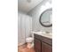 Bathroom featuring a vanity with an oval mirror and a shower with a curtain at 3898 Chelsea Ter, Greenwood, IN 46143