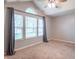Bright bedroom featuring vaulted ceiling, large windows, and neutral tones at 3898 Chelsea Ter, Greenwood, IN 46143