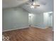 Bright living room with hardwood floors and neutral paint at 3898 Chelsea Ter, Greenwood, IN 46143