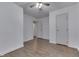 Clean, spacious bedroom featuring wood floors, ample natural light, and ensuite entrance at 454 E Broadway St, Greenwood, IN 46143
