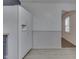 Kitchen with white refrigerator and view into another room at 454 E Broadway St, Greenwood, IN 46143