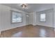 Spacious living room featuring hardwood floors and large windows at 454 E Broadway St, Greenwood, IN 46143