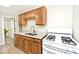 Well lit kitchen featuring stainless steel gas range and modern cabinets at 4910 W Caven St, Indianapolis, IN 46241