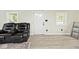 Bright living room with new floors, fresh paint and a modern feel at 4910 W Caven St, Indianapolis, IN 46241