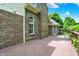 Spacious wooden back deck perfect for outdoor entertaining with a brick exterior and chimney at 50 Charing Cross Rd, Indianapolis, IN 46217