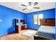 Bedroom featuring hardwood floors, a ceiling fan, a desk and a window at 50 Charing Cross Rd, Indianapolis, IN 46217