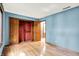 Bright bedroom with wood floors, double sliding door closets, and great lighting at 50 Charing Cross Rd, Indianapolis, IN 46217