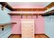 Walk-in closet featuring built-in shelving and a dresser at 50 Charing Cross Rd, Indianapolis, IN 46217