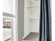 View of open closet space with blue curtains at 514 Dorman St, Indianapolis, IN 46202