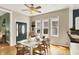 Dining room with hardwood floors and an entrance to an outdoor area at 514 Dorman St, Indianapolis, IN 46202