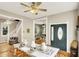 Bright dining room with wood floors and an entrance to an outdoor area at 514 Dorman St, Indianapolis, IN 46202