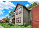 Two story home on corner lot showing red trim and manicured yard at 514 Dorman St, Indianapolis, IN 46202