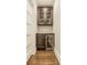 Stylish bar area features custom cabinetry, a beverage refrigerator, and herringbone tile backsplash, perfect for entertaining guests at 5254 N Park Ave, Indianapolis, IN 46220