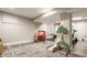 View of finished basement with modern flooring and play area with various toys and slide at 5254 N Park Ave, Indianapolis, IN 46220