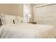 Well-lit bedroom with a plush bed and sliding closet doors providing ample storage at 5254 N Park Ave, Indianapolis, IN 46220