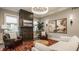 Elegant living room with a modern fireplace, comfortable seating, and sophisticated lighting at 5254 N Park Ave, Indianapolis, IN 46220