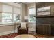 Bright living room with a modern fireplace, comfortable seating, and hardwood floors at 5254 N Park Ave, Indianapolis, IN 46220