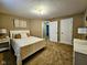 Bedroom featuring plush carpeting and white bedroom furniture at 5347 Sampson Dr, Indianapolis, IN 46237