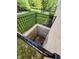 Exterior shot of a window well with a ladder and safety fencing at 5347 Sampson Dr, Indianapolis, IN 46237