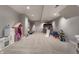 Finished basement with playroom, play area, and neutral carpeting at 5430 N Washington Blvd, Indianapolis, IN 46220