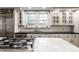 Kitchen featuring a marble island, stainless appliances, and bright white cabinets at 5430 N Washington Blvd, Indianapolis, IN 46220