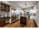 Spacious kitchen with an island, stainless steel refrigerator, and custom cabinetry at 5430 N Washington Blvd, Indianapolis, IN 46220