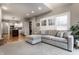 Cozy living room with a plush sectional sofa and access to a modern kitchen at 5430 N Washington Blvd, Indianapolis, IN 46220