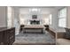 Bright bedroom featuring a skylight, large rug, and neutral decor at 5430 N Washington Blvd, Indianapolis, IN 46220