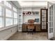 Bright office with custom built-ins, neutral colors, and large windows for natural light at 5430 N Washington Blvd, Indianapolis, IN 46220